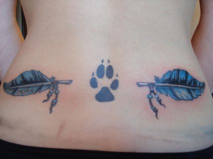 Feather And Claw Lower Back Tattoo